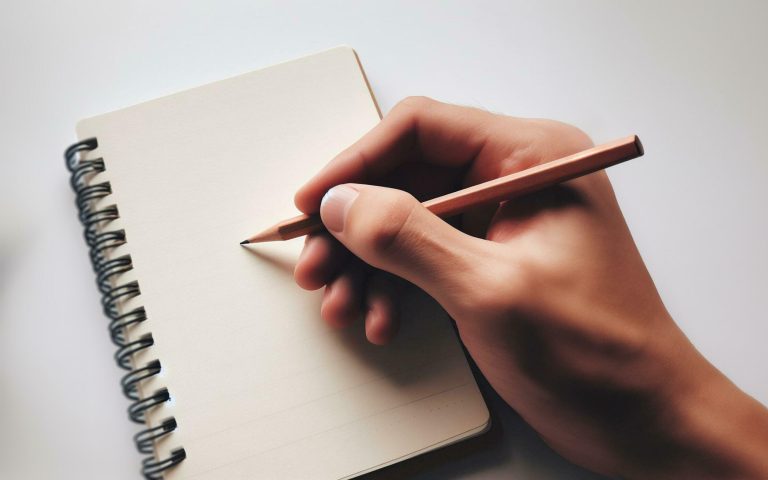 ai-generated-blank-notebook-the-hand-holding-the-pencil-is-about-to-start-writing-in-a-notebook-taking-notes-drawing-with-a-pencil-free-photo